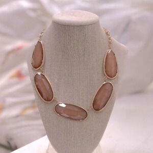 Macy’s oversized amber colored gem linked statement necklace